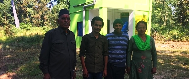 4 bufferzone committee members standing in front of the Green Tower