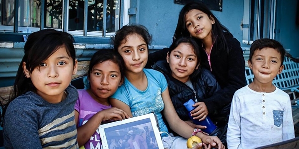 Children at the Madre Asunta migrant Center